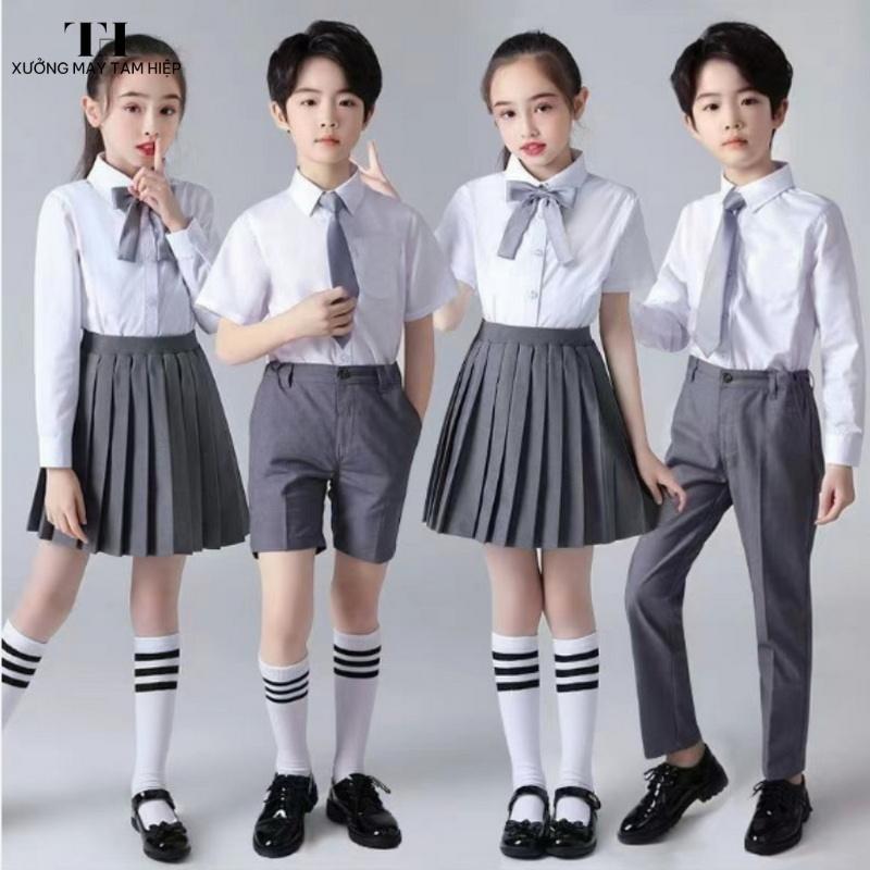Đồng phục sơ mi học sinh 6 Đồng phục sơ mi phối cà vạt hoặc nơ giúp trang phục thêm nổi bật, sang trọng, thích hợp chụp kỷ yếu hoặc sự kiện ngoại khóa.