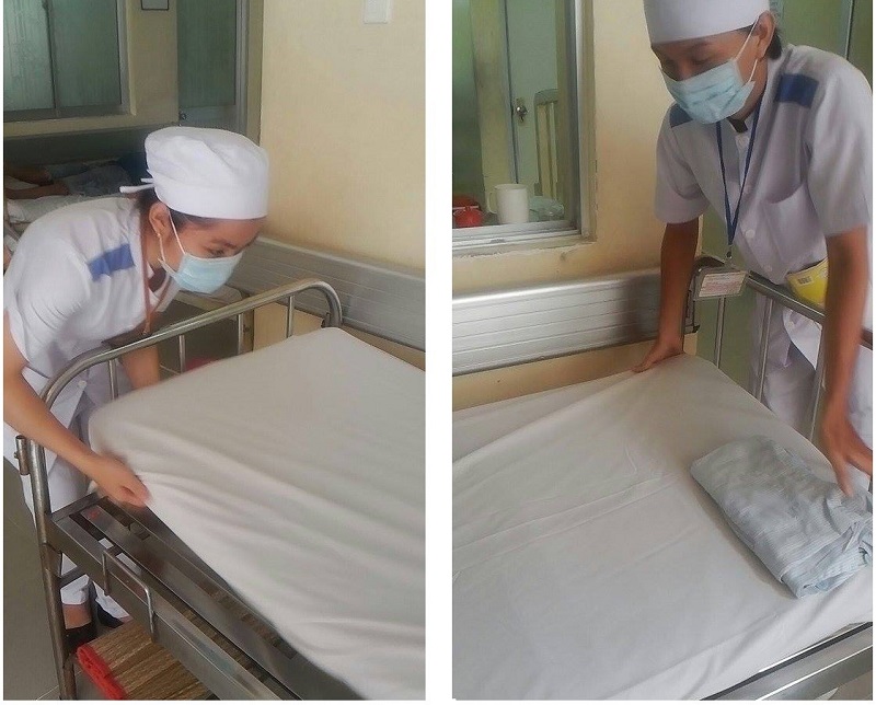 Ga giường y tế 1 Ga giường y tế màu trắng trải trên giường bệnh.